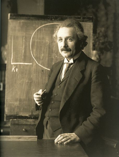 Albert Einstein during a lecture in Vienna in 1921 (published before 1923 and public domain in the US)